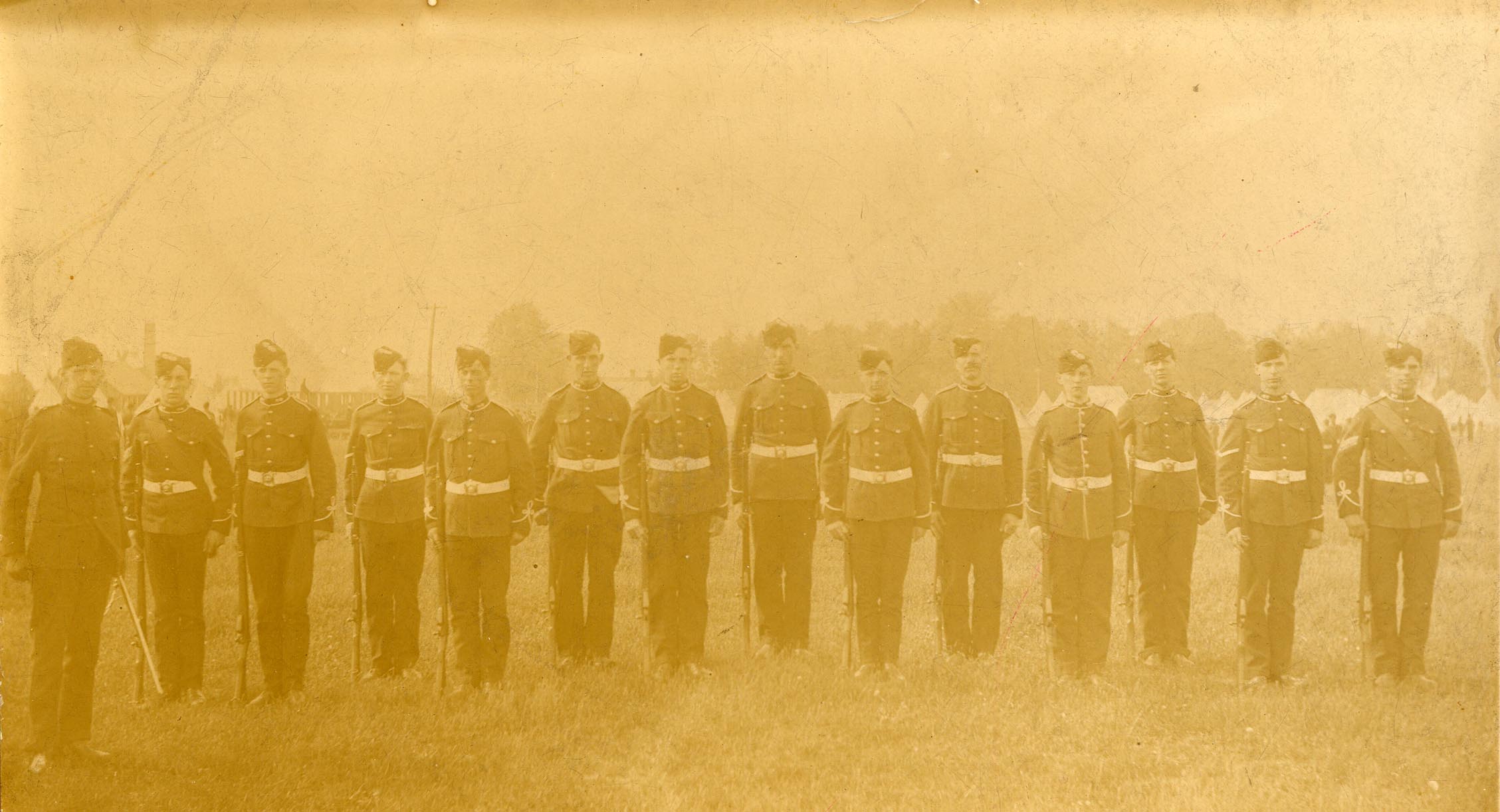 Very%20faded%2C%20yellowed%20black%20and%20white%20photograph%20of%20some%20of%20the%2021st%20Regiment%20of%20the%20Essex%20Fusiliers